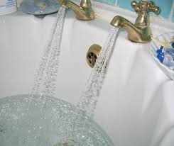 A bath with the taps running